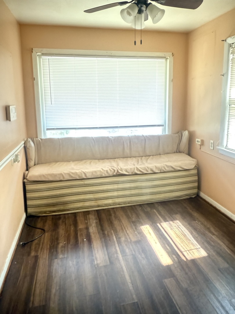 10553 South Calumet Avenue Chicago, IL 60628 - Photo 19 of 21 a bedroom with a bed and window