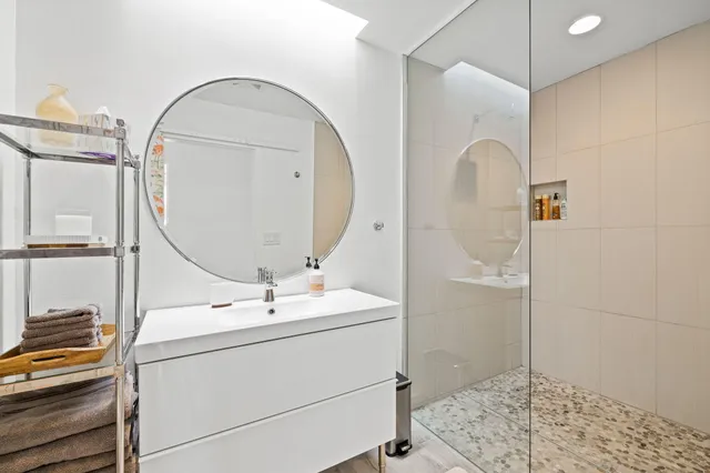 a bathroom with a sink and a mirror