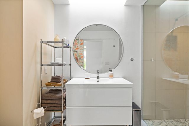 a utility room with a sink dryer and washer