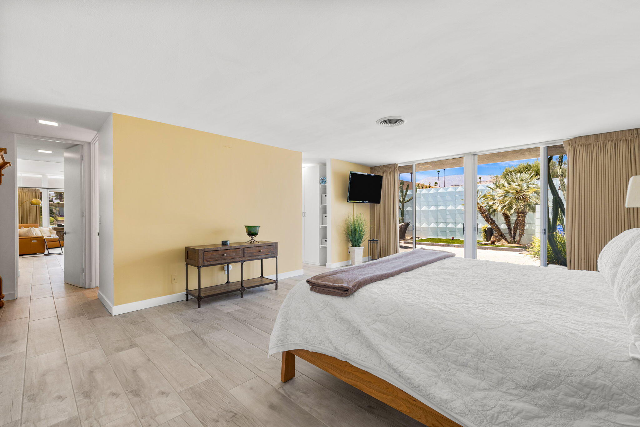 72857 El Paseo, Unit 502 Palm Desert, CA 92260 - Photo 30 of 48 a living room with furniture and a table