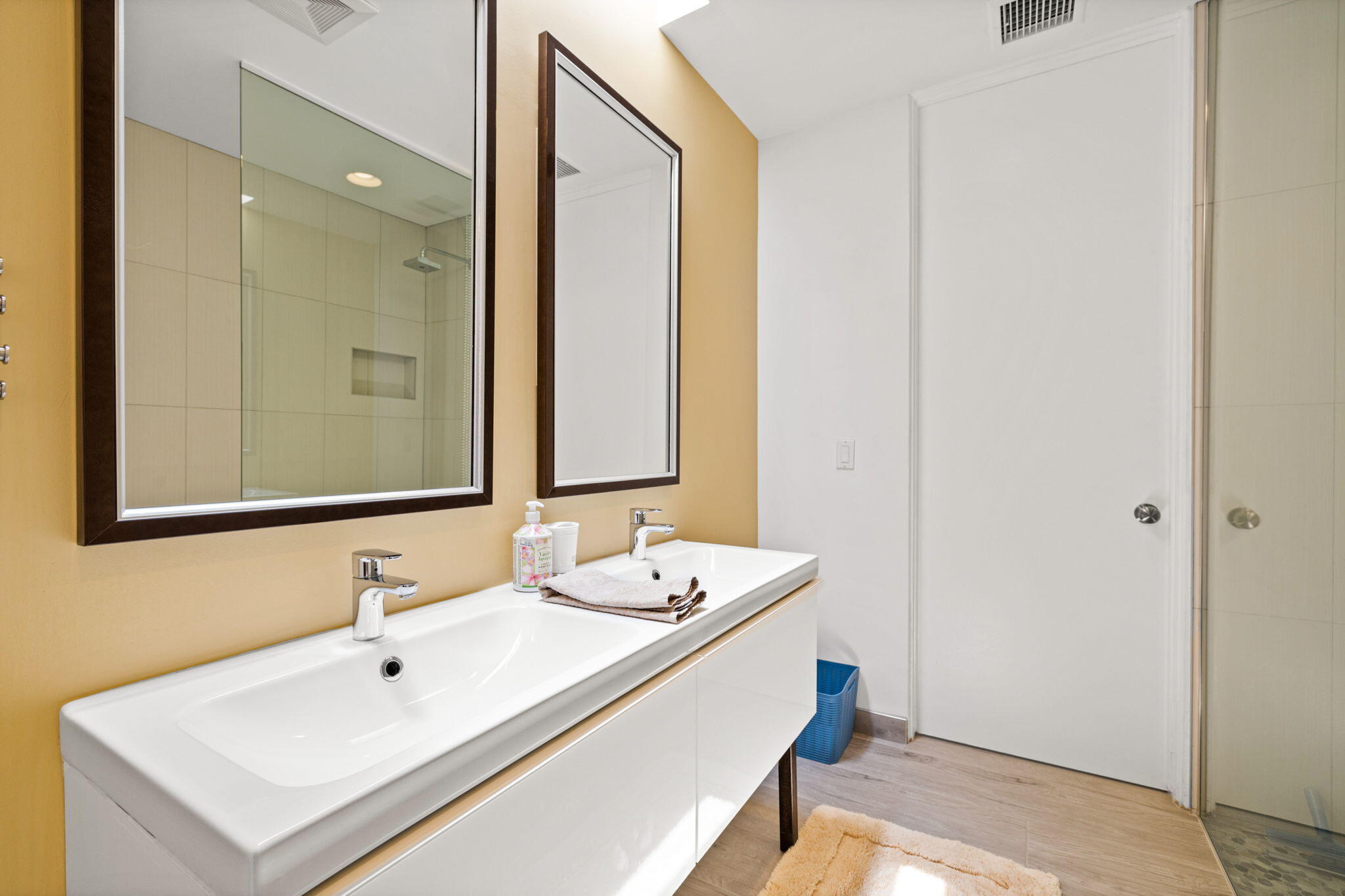72857 El Paseo, Unit 502 Palm Desert, CA 92260 - Photo 34 of 48 a bathroom with a sink and a mirror