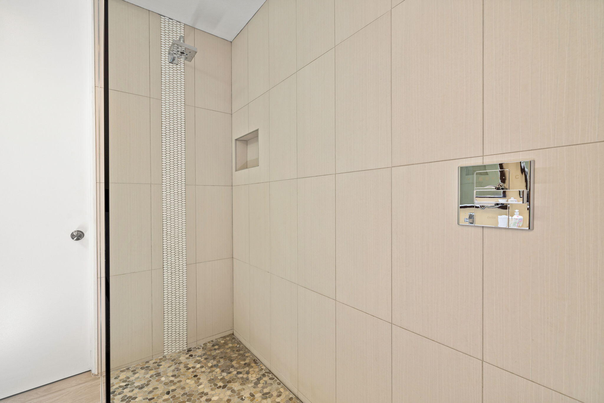 72857 El Paseo, Unit 502 Palm Desert, CA 92260 - Photo 35 of 48 a bathroom with a shower