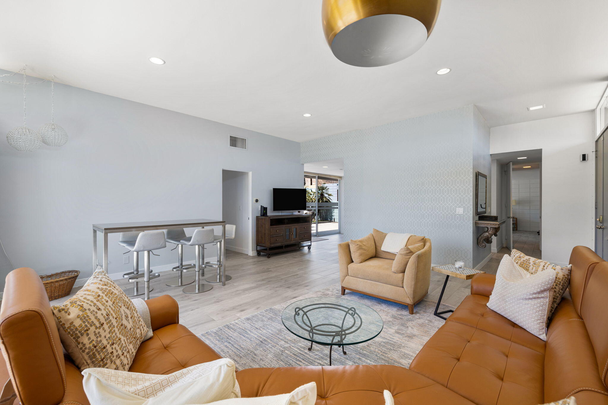 72857 El Paseo, Unit 502 Palm Desert, CA 92260 - Photo 7 of 48 a living room with furniture and a rug