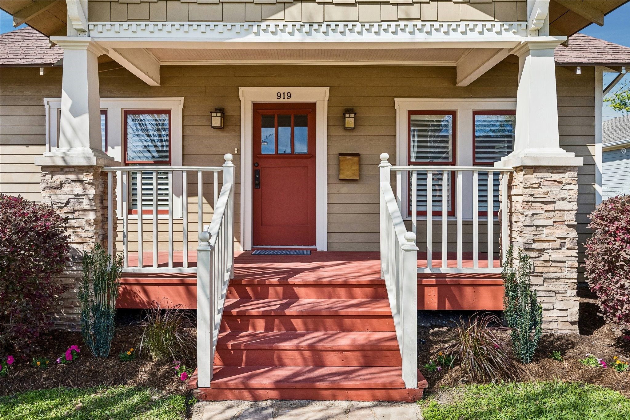 919 Key Street Houston, TX 77009 - Photo 3 of 39 A welcoming front porch framed by classic architectural details—creating a warm, inviting entry that sets the tone for the home’s timeless character.