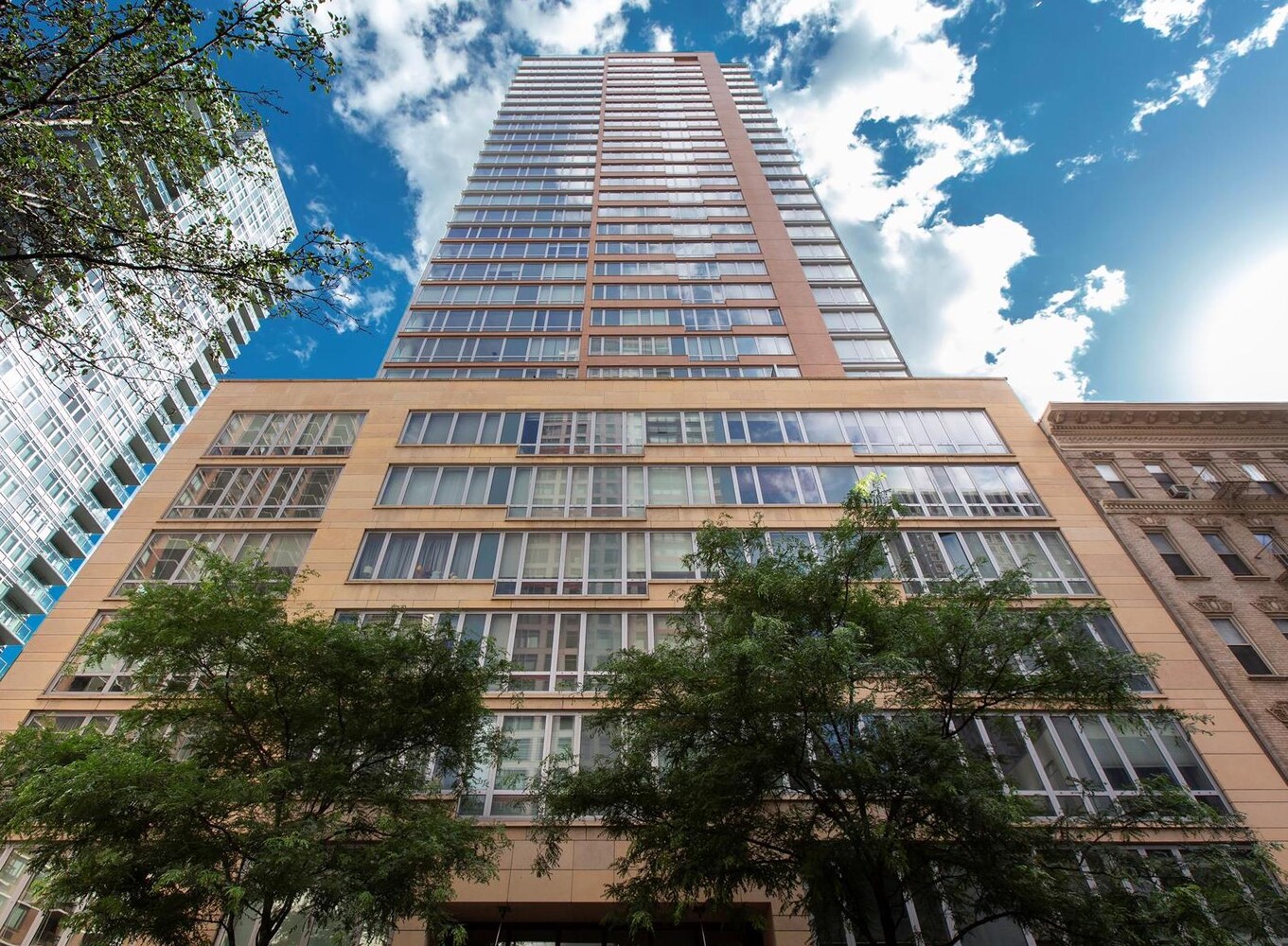 250 East 53rd Street, Unit 404 Manhattan, NY 10022 - Photo 11 of 12 a front view of a building