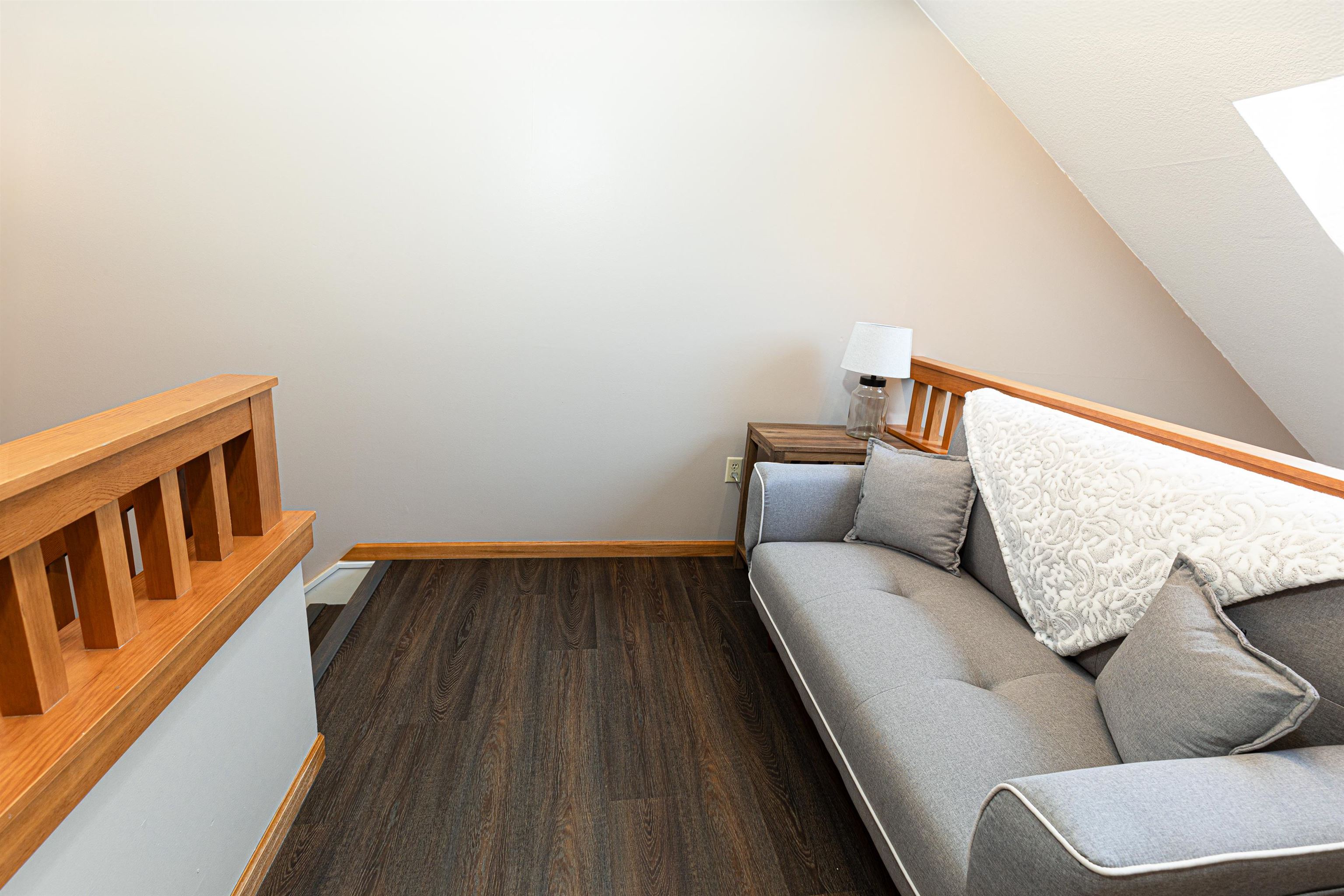 26 Poplar Ridge Galena, IL 61036 - Photo 34 of 55 a hallway with a couch in wooden floor