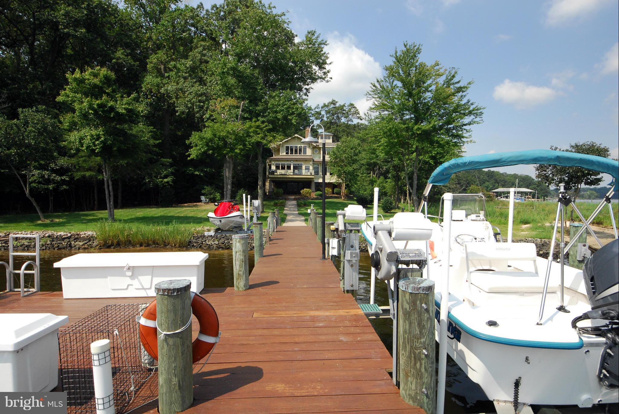 Private pier has 8 ft water depth