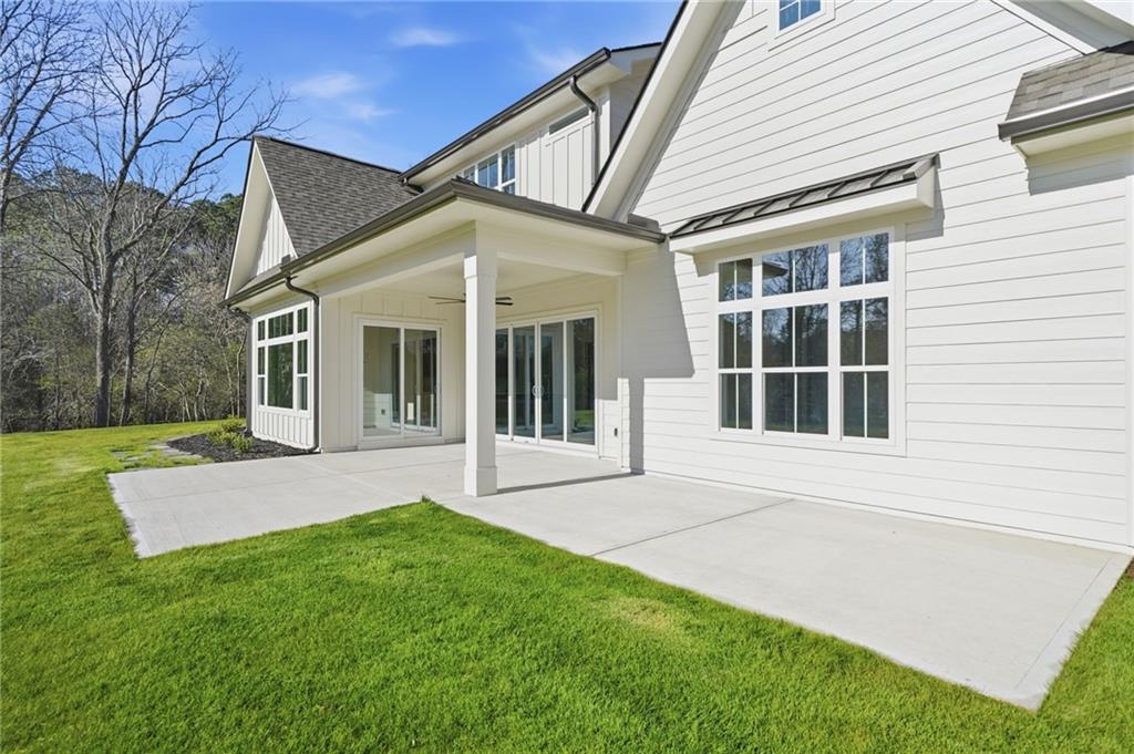 1248 Avery Road Canton, GA 30115 - Photo 12 of 64 a view of house with a garden