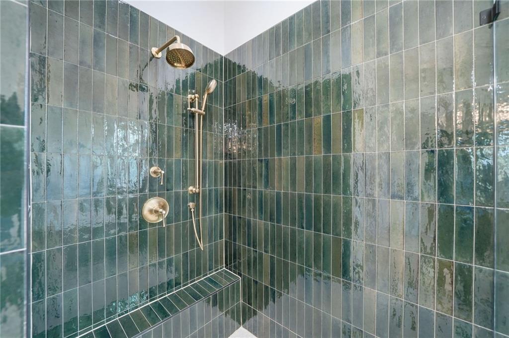 1248 Avery Road Canton, GA 30115 - Photo 40 of 64 a bathroom with a shower and a sink