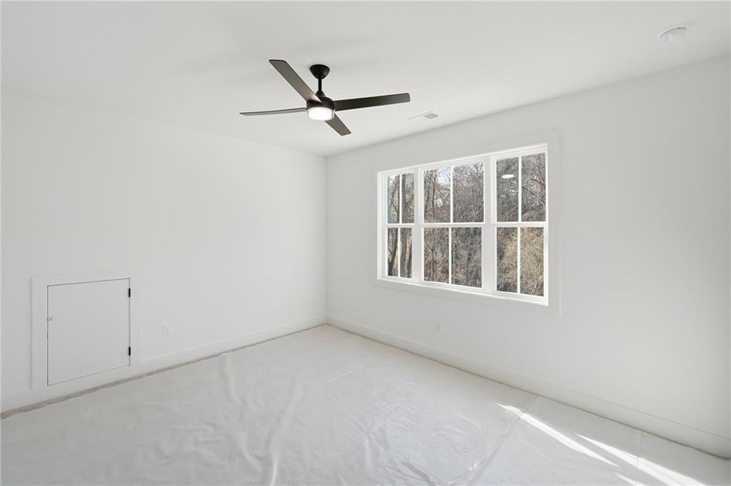 1248 Avery Road Canton, GA 30115 - Photo 49 of 64 an empty room with a window