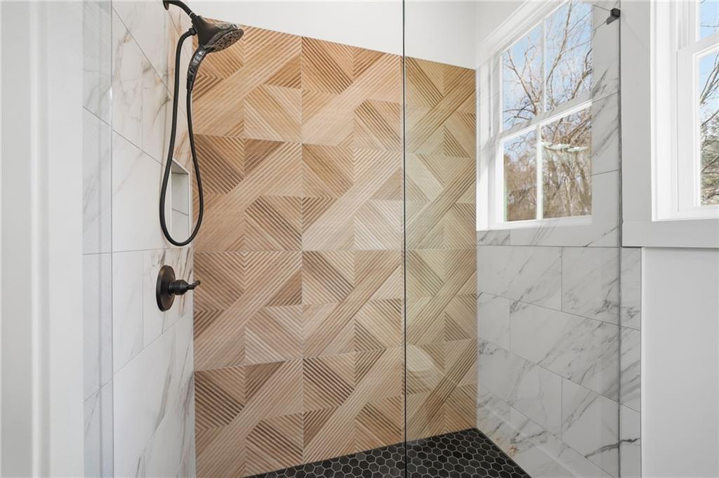 1248 Avery Road Canton, GA 30115 - Photo 63 of 64 a bathroom with a shower