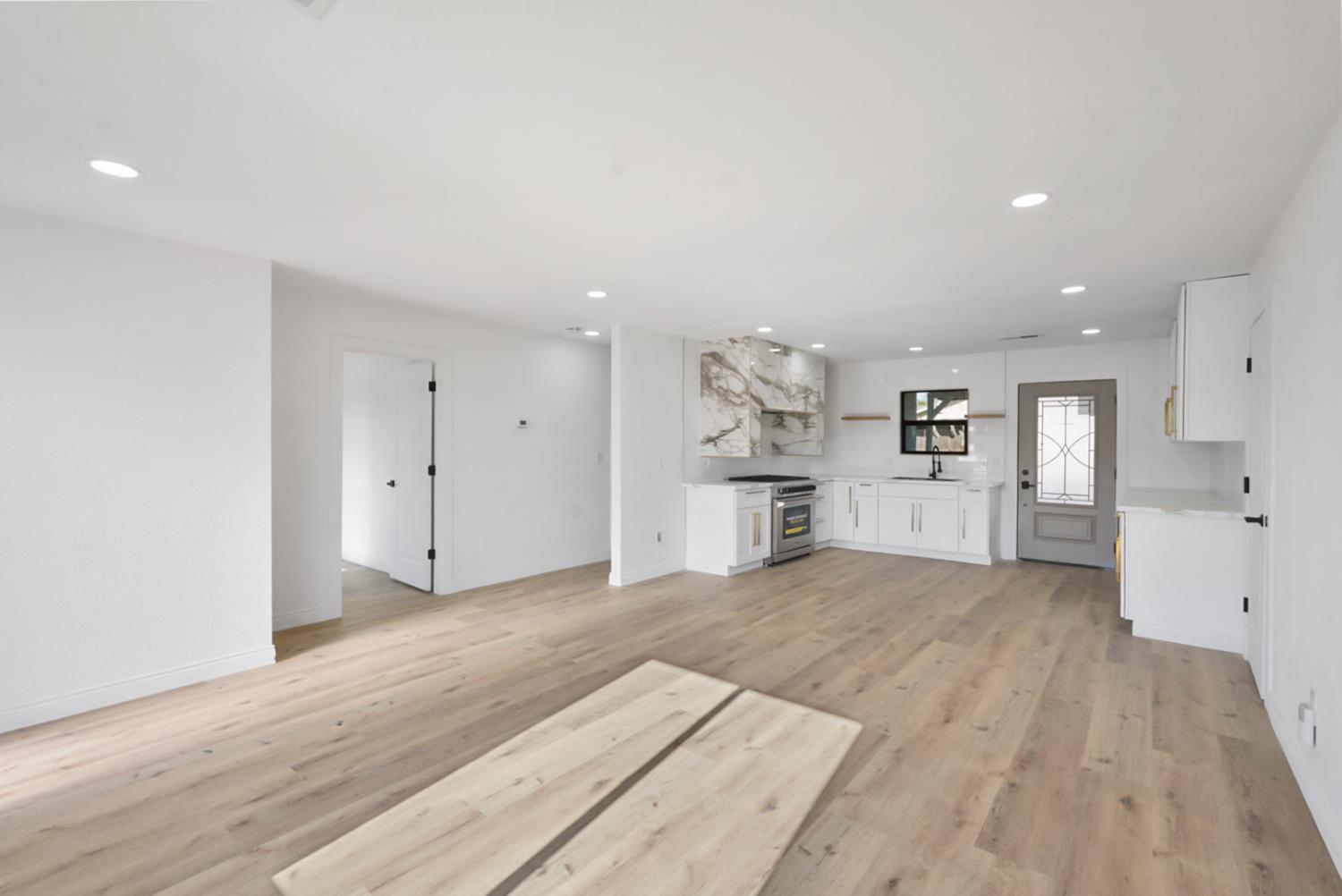 43 Skylark Street Merced, CA 95341 - Photo 11 of 14 a view of empty room with wooden floor