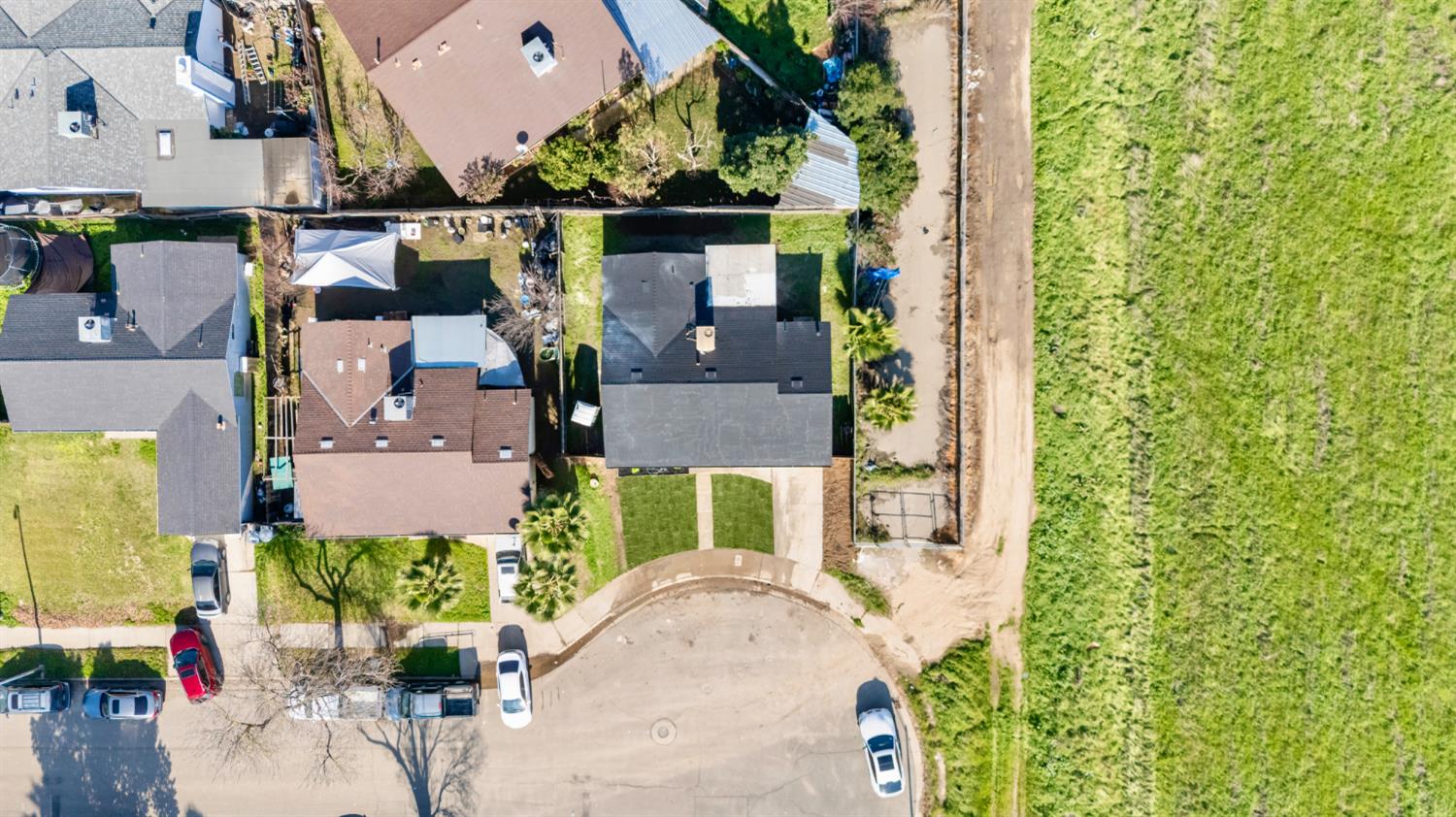 43 Skylark Street Merced, CA 95341 - Photo 14 of 14 an aerial view of a house with a yard and a large tree