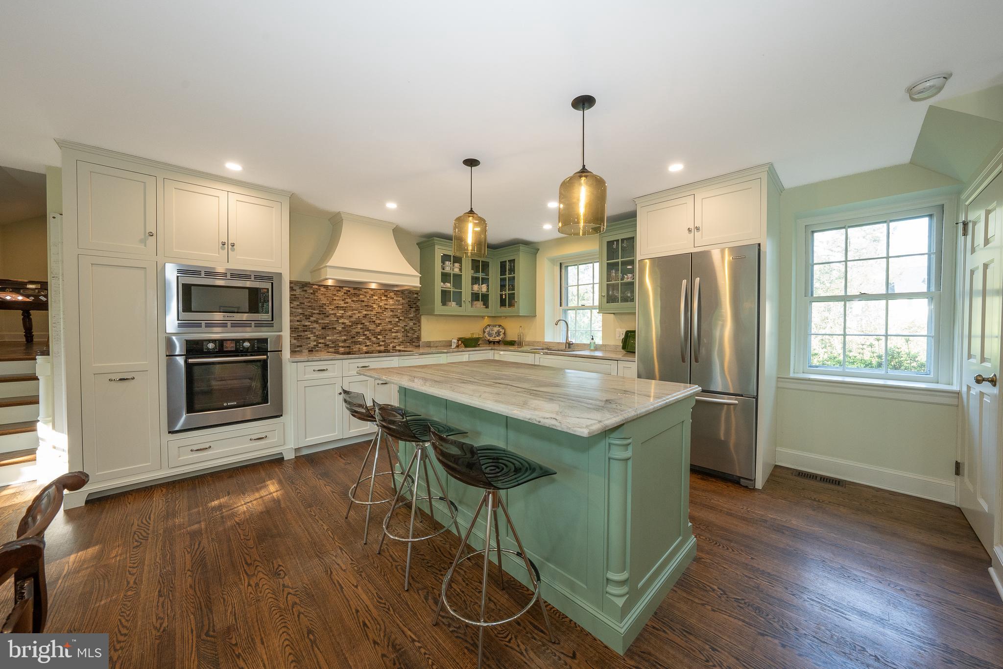510 Lynmere Road Bryn Mawr, PA 19010 - Photo 12 of 44 a kitchen with stainless steel appliances granite countertop a stove and a refrigerator