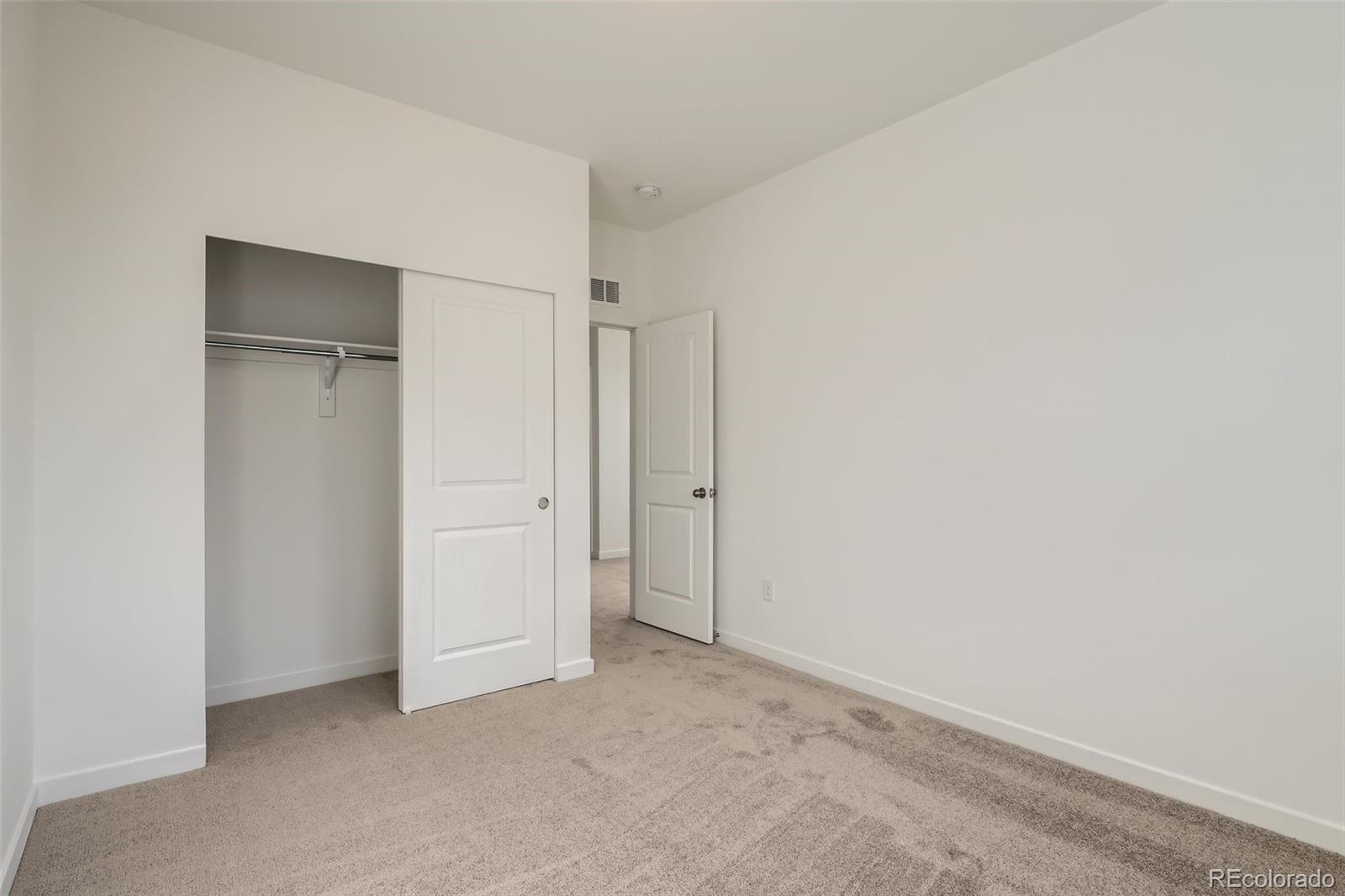 1979 South Gold Bug Way Aurora, CO 80018 - Photo 23 of 28 a view of an empty room