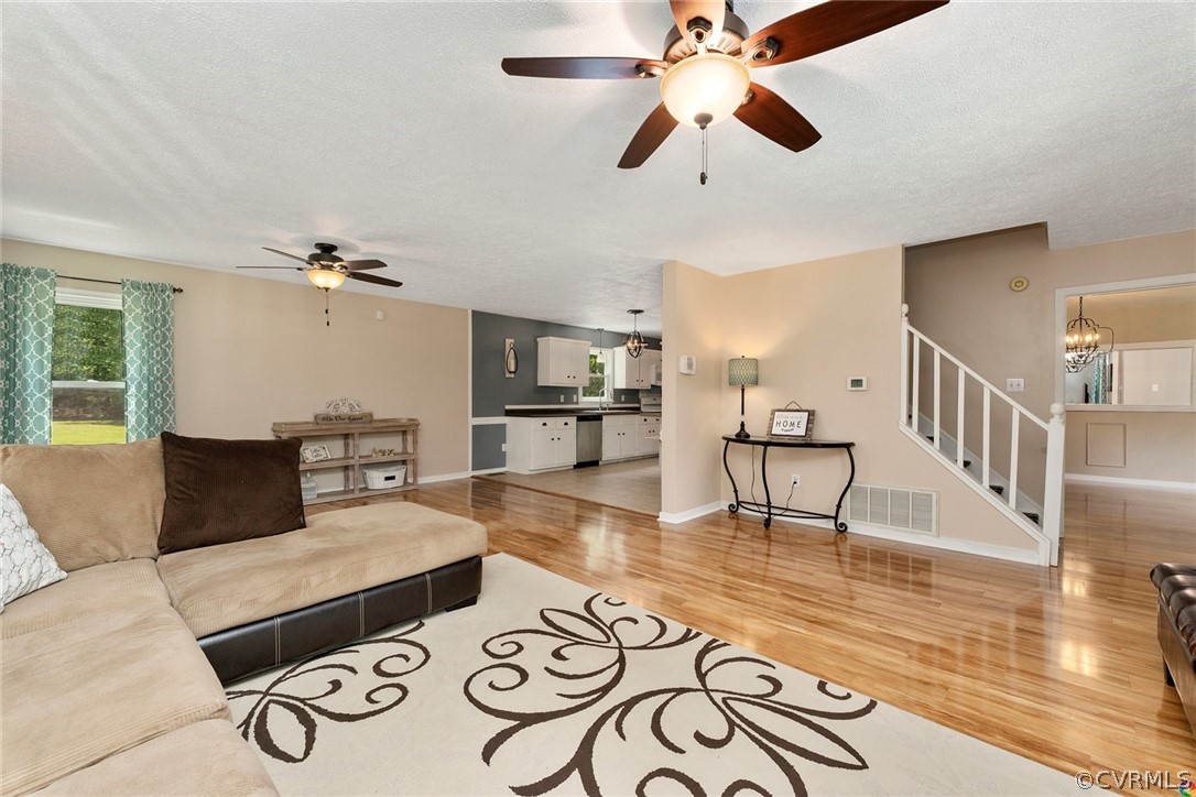 13571 Bailey Bridge Road Midlothian, VA 23112 - Photo 11 of 46 a living room with furniture and wooden floor