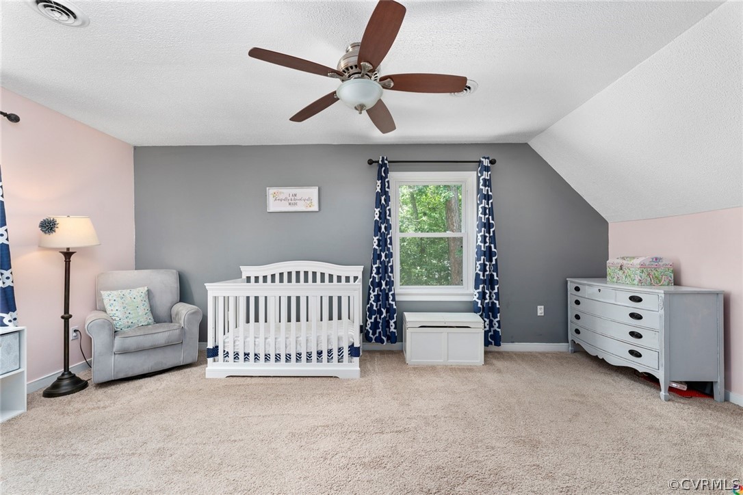 13571 Bailey Bridge Road Midlothian, VA 23112 - Photo 29 of 46 a bed room with a bed and a chair