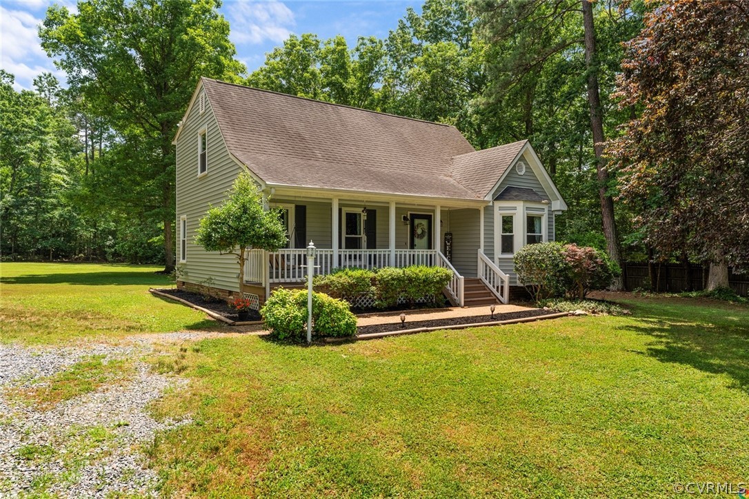 13571 Bailey Bridge Road Midlothian, VA 23112 - Photo 3 of 46 a view of a house with swimming pool and a yard