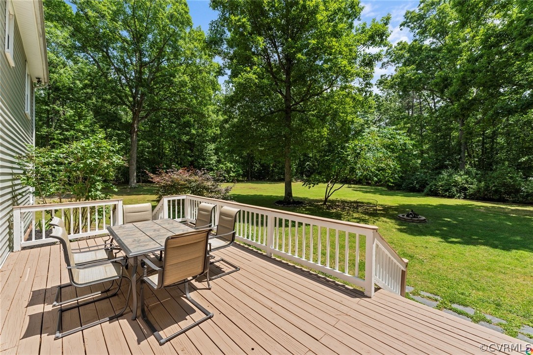 13571 Bailey Bridge Road Midlothian, VA 23112 - Photo 31 of 46 a view of a two chairs and table on the deck