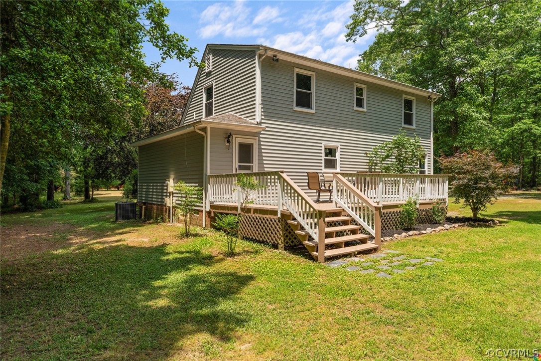 13571 Bailey Bridge Road Midlothian, VA 23112 - Photo 33 of 46 a front view of a house with a yard