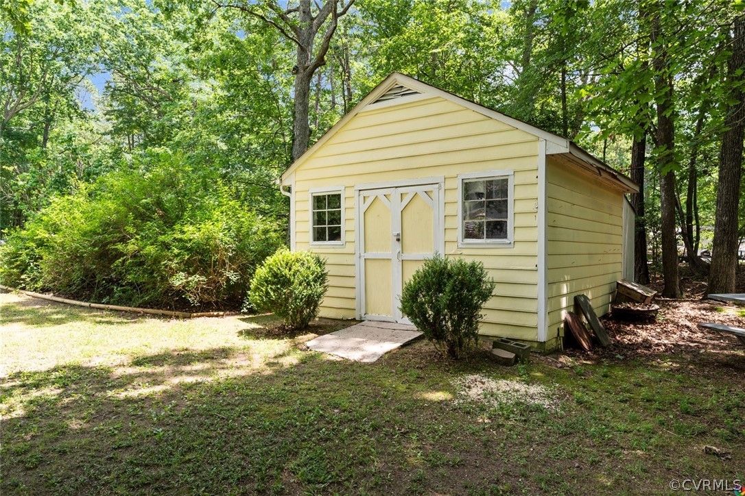 13571 Bailey Bridge Road Midlothian, VA 23112 - Photo 36 of 46 a view of a house with a yard