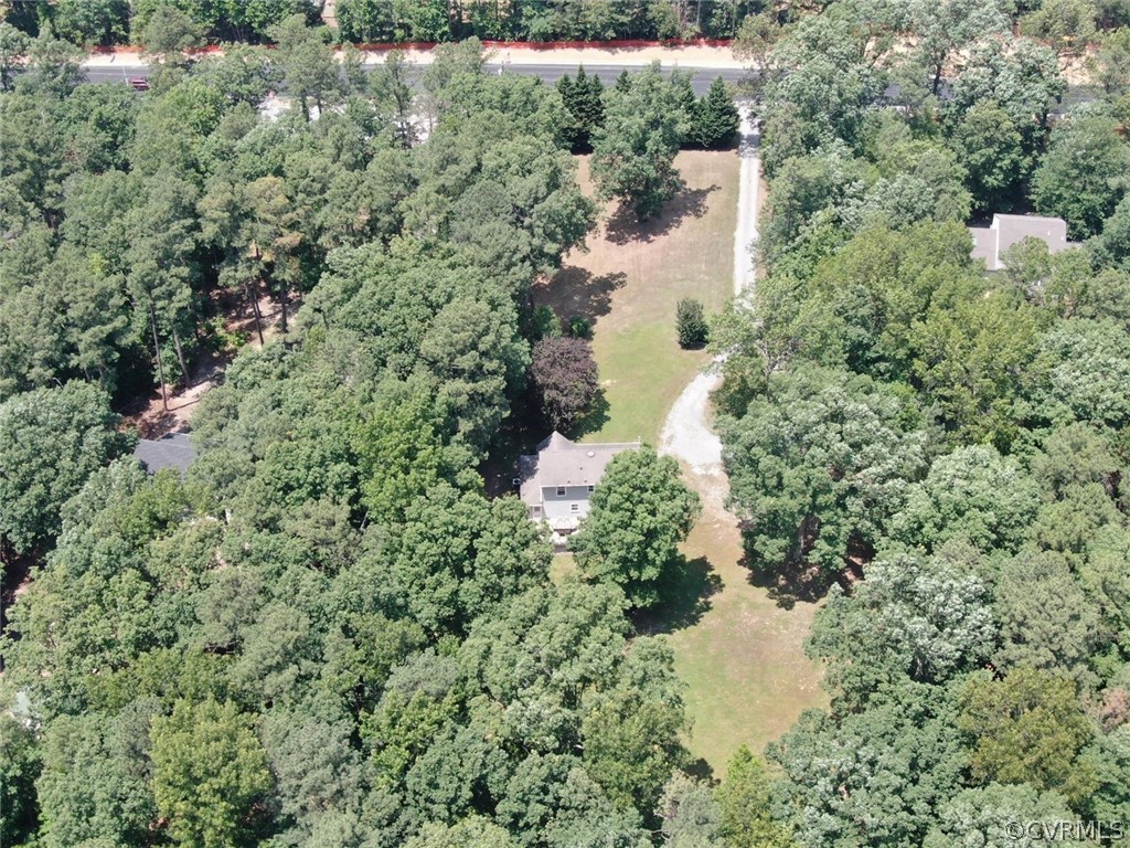 13571 Bailey Bridge Road Midlothian, VA 23112 - Photo 45 of 46 a view of a lake with a house