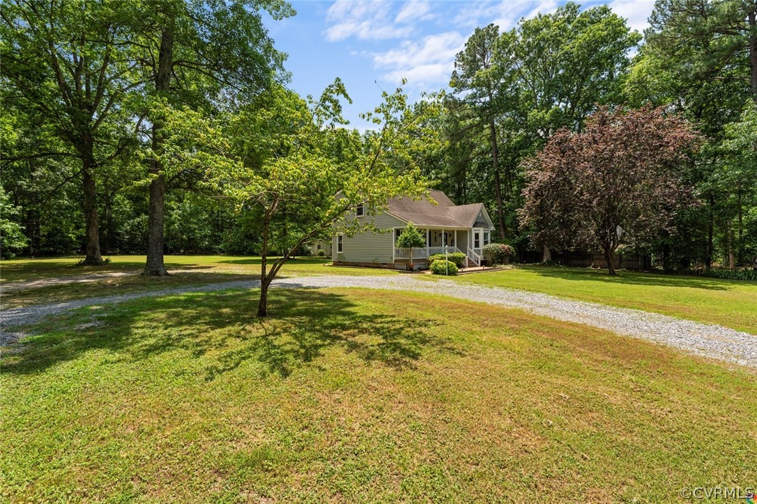 13571 Bailey Bridge Road Midlothian, VA 23112 - Photo 5 of 46 a house view with swimming pool in front of it