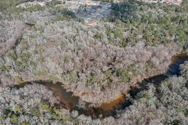 a view of a covered with green field