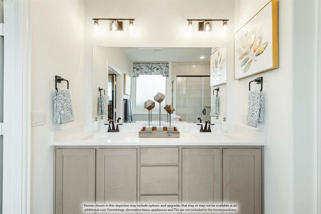 1144 Hitching Post Way Oak Point, TX 75068 - Photo 27 of 39 a bathroom with a sink and a mirror