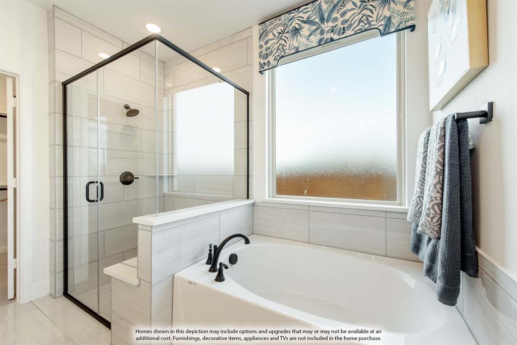 1144 Hitching Post Way Oak Point, TX 75068 - Photo 28 of 39 a bathroom with a tub and shower
