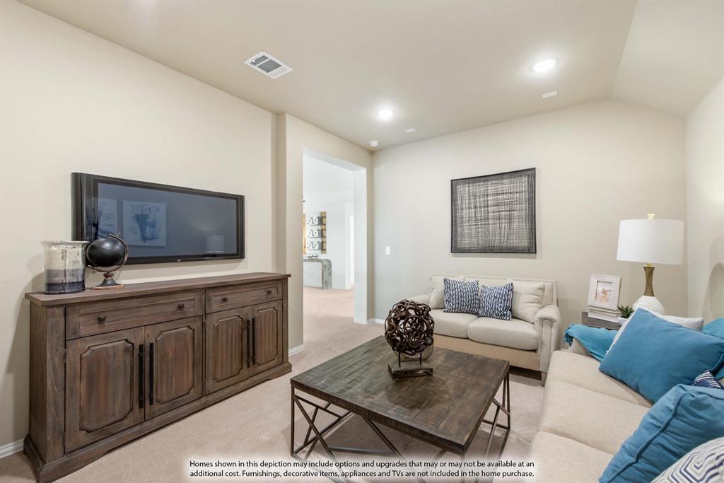 1144 Hitching Post Way Oak Point, TX 75068 - Photo 34 of 39 a living room with furniture and a wooden floor