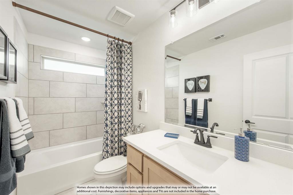 1144 Hitching Post Way Oak Point, TX 75068 - Photo 36 of 39 a bathroom with a sink a toilet and shower