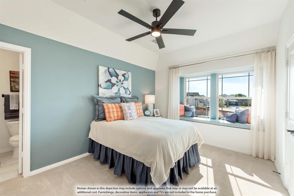 1144 Hitching Post Way Oak Point, TX 75068 - Photo 37 of 39 a bedroom with a bed and a large window
