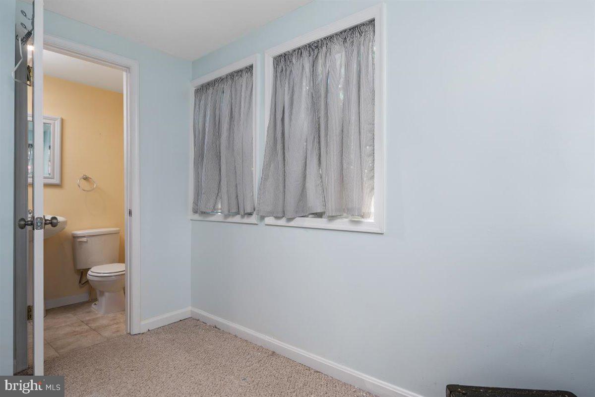 8711 Bradford Road Silver Spring, MD 20901 - Photo 7 of 40 Side Room off Living Room w/En suite Bath
