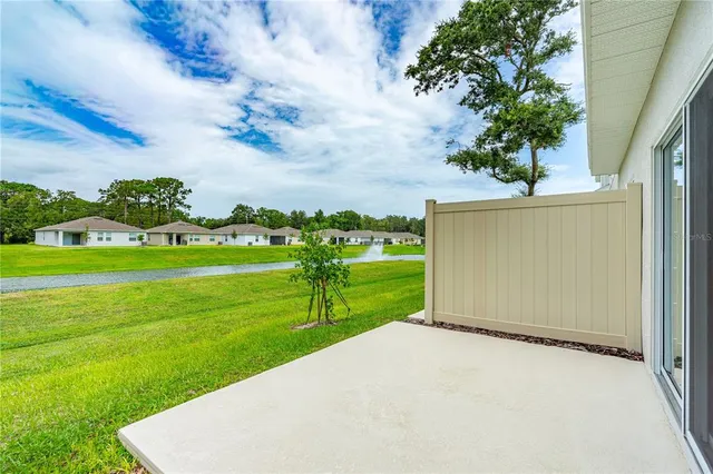 an aerial view of a house with a garden