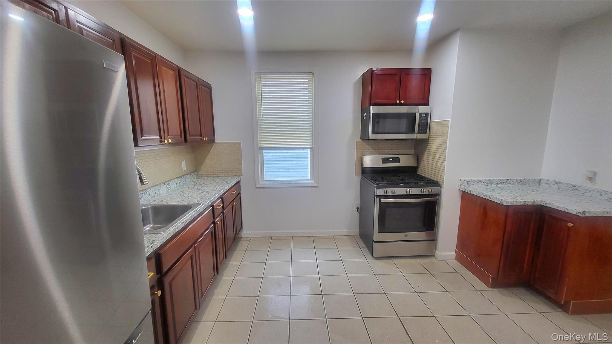 49 Carroll Street, Unit 1 Poughkeepsie, NY 12601 - Photo 3 of 18 Kitchen With Stainless Steel Appliances