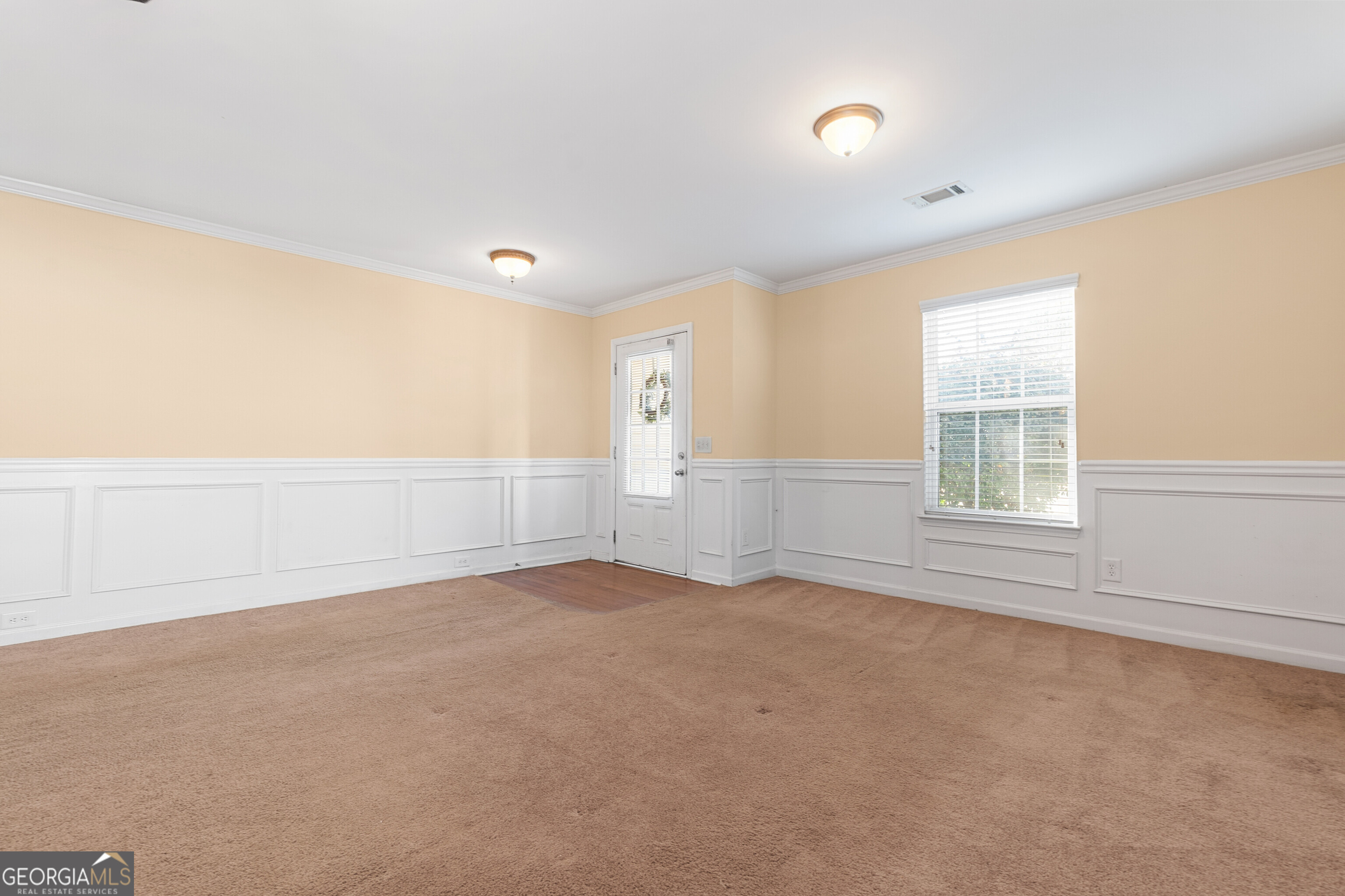 102 Steeple Court Perry, GA 31069 - Photo 22 of 37 a view of an empty room with a window