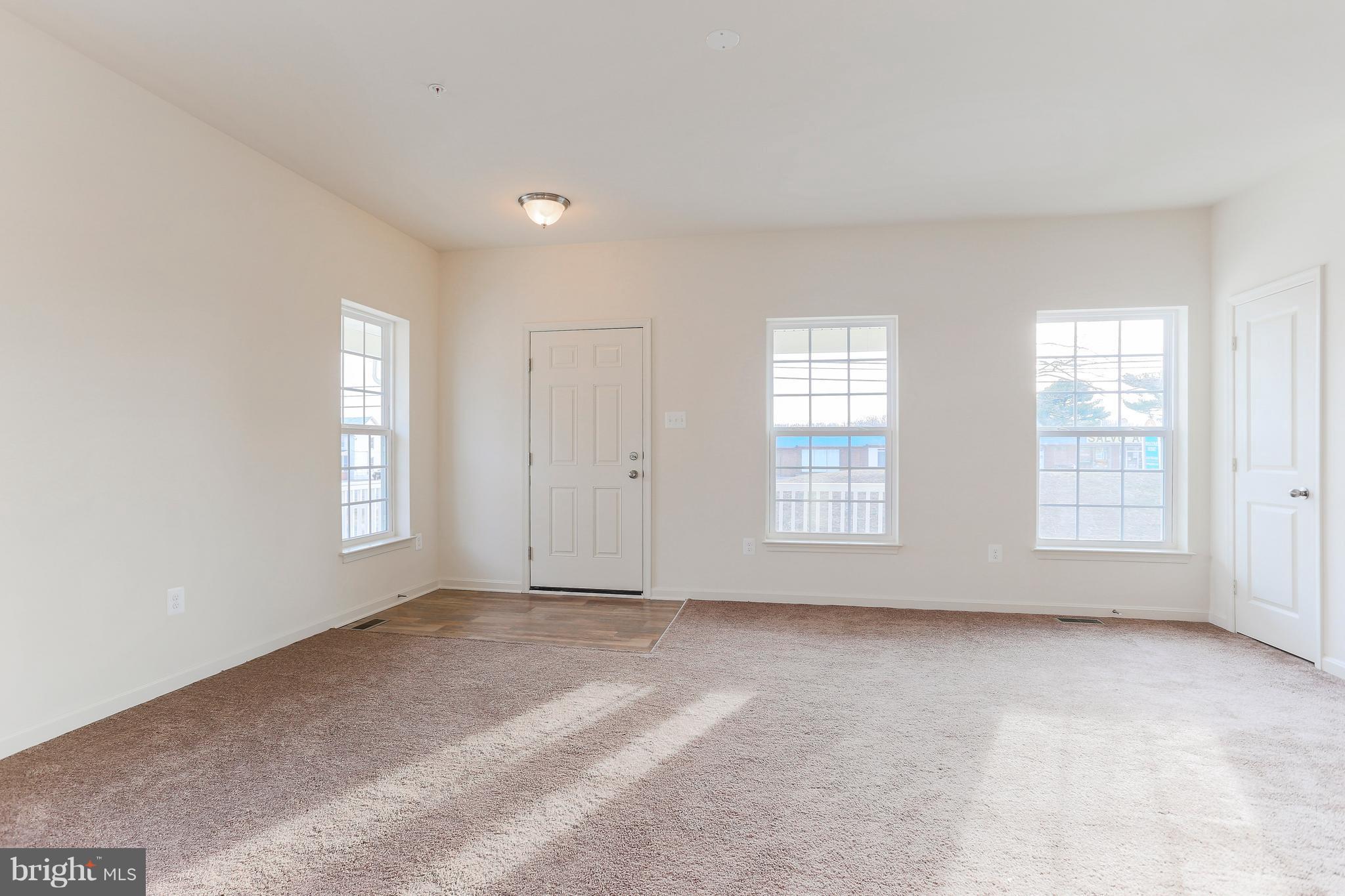 7 Back River Neck Road Baltimore, MD 21221 - Photo 20 of 29 an empty room with windows