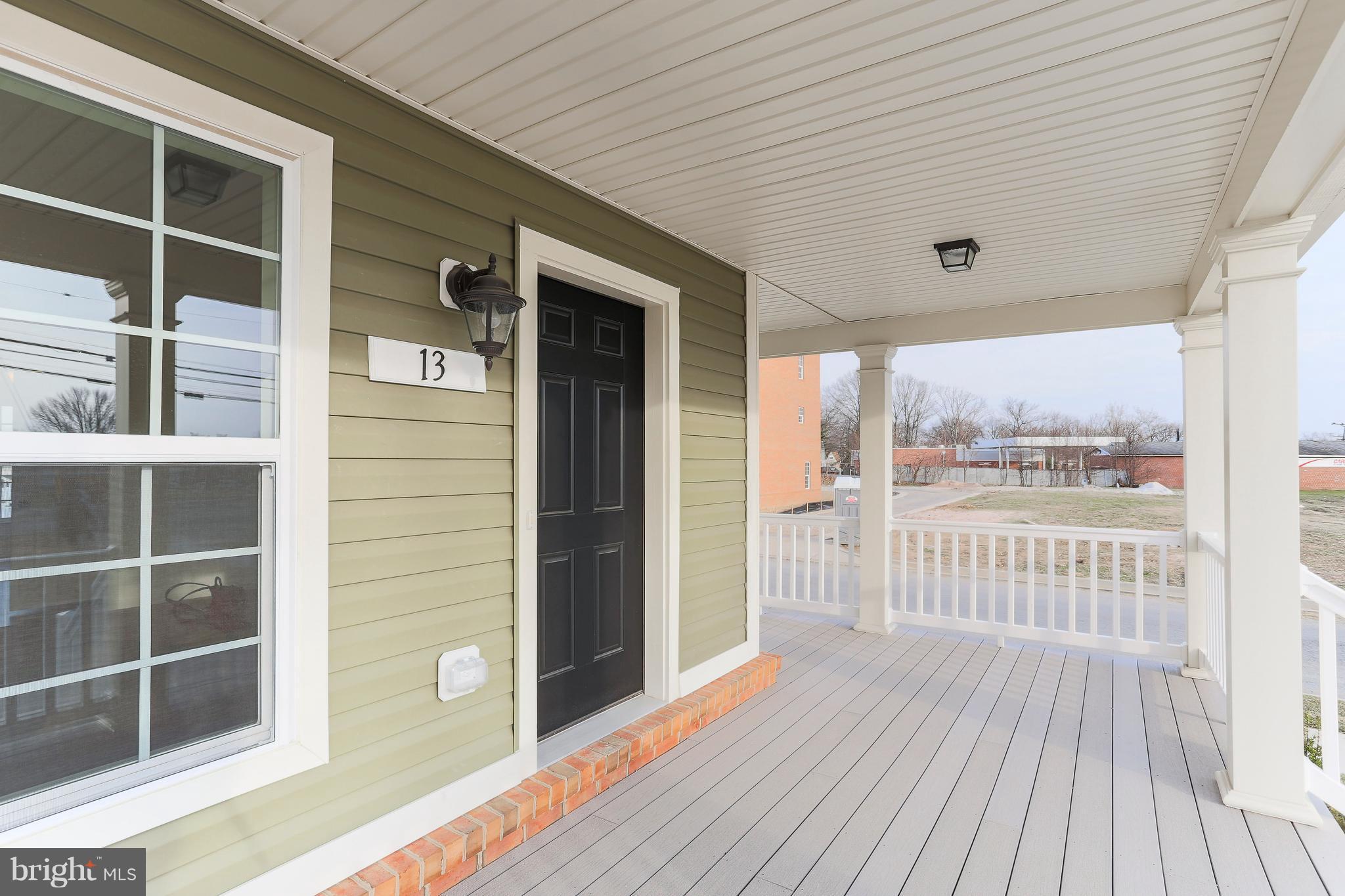 7 Back River Neck Road Baltimore, MD 21221 - Photo 3 of 29 a view of a balcony with wooden floor
