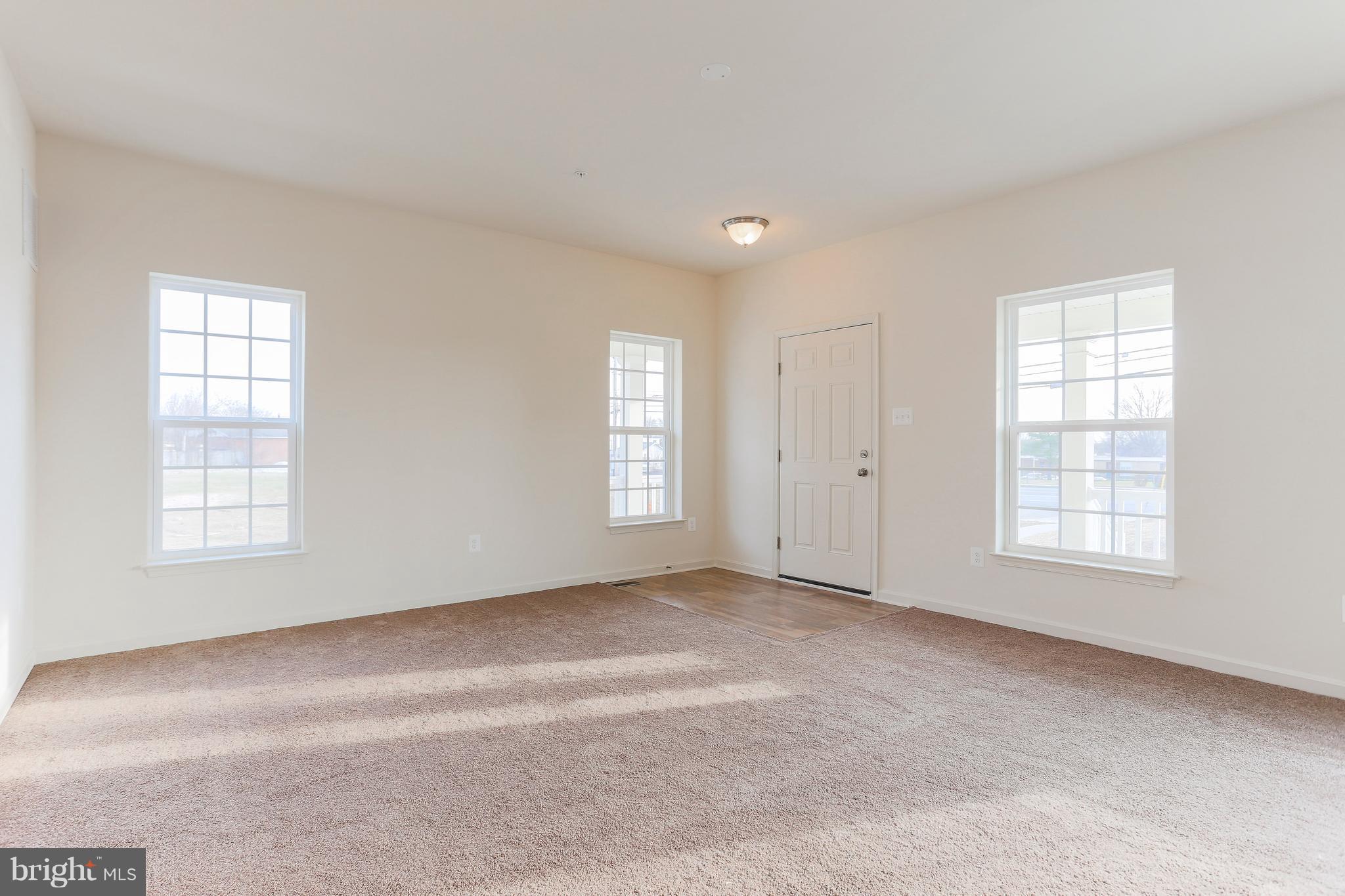 7 Back River Neck Road Baltimore, MD 21221 - Photo 21 of 29 an empty room with windows