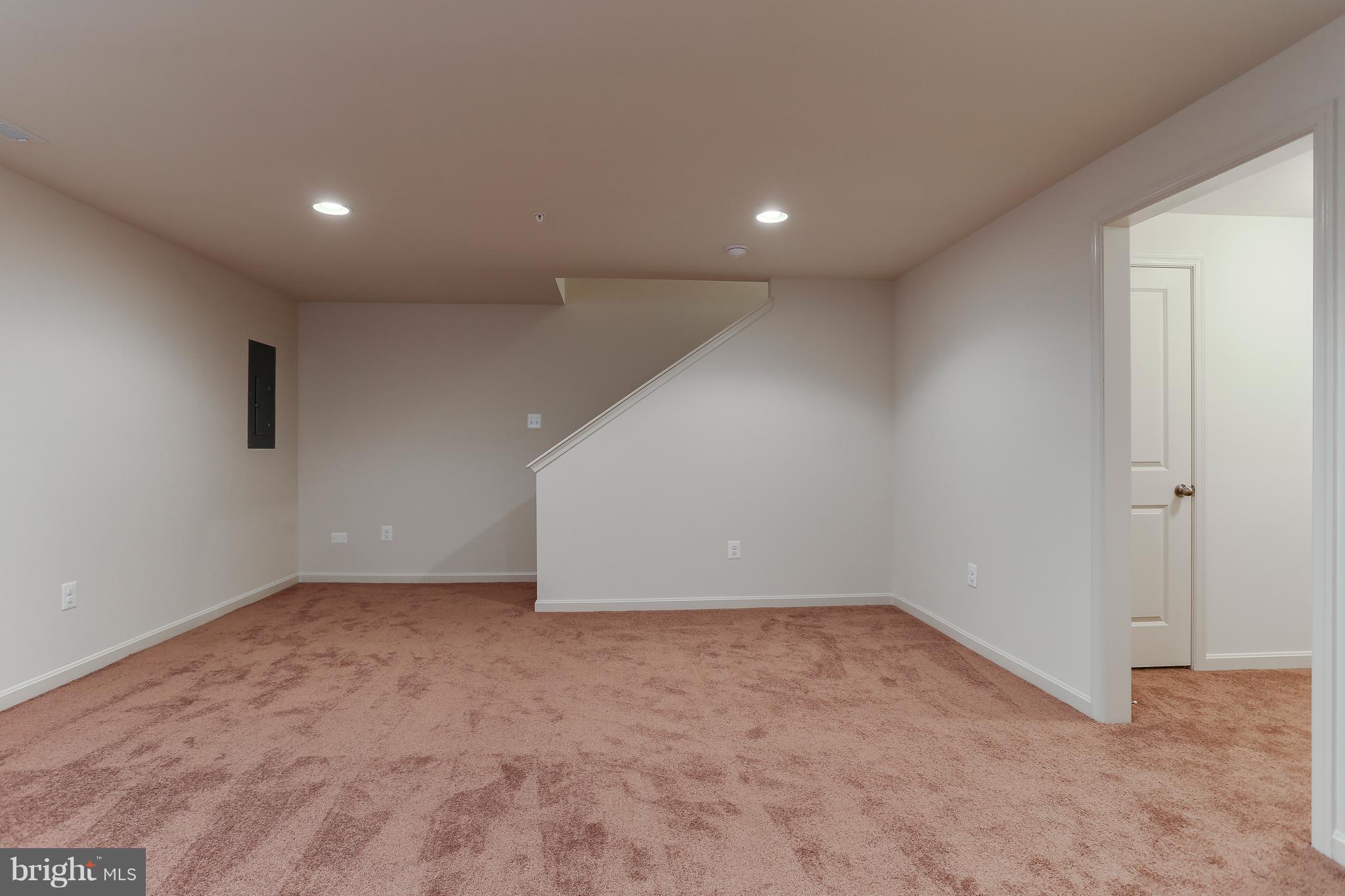 7 Back River Neck Road Baltimore, MD 21221 - Photo 6 of 29 an empty room with a empty space and windows