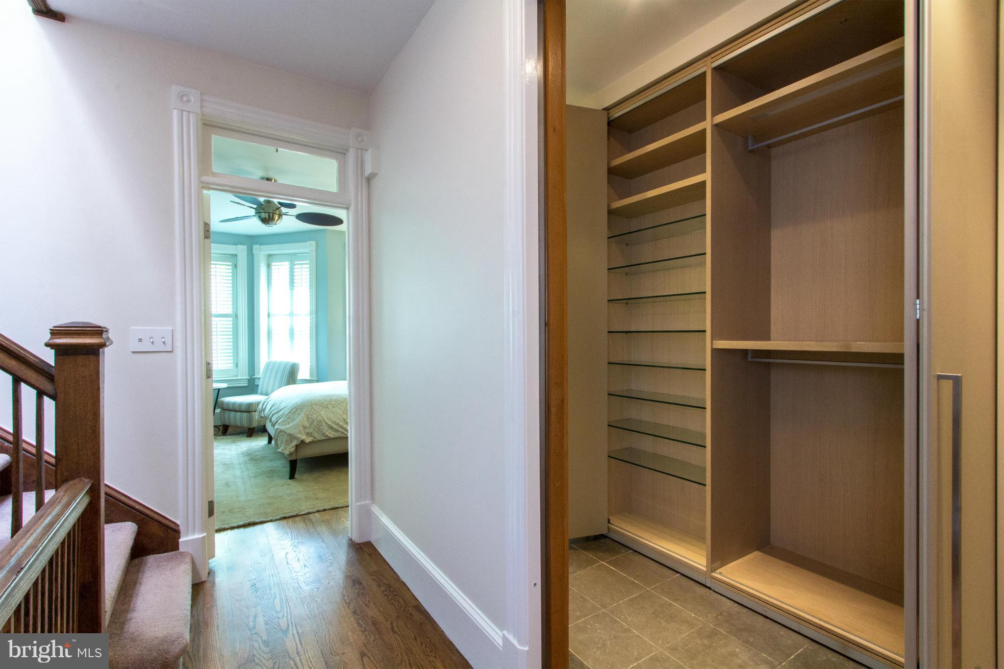 124 3rd Street Northeast Washington, DC 20002 - Photo 12 of 30 a view of a hallway to a livingroom and a window
