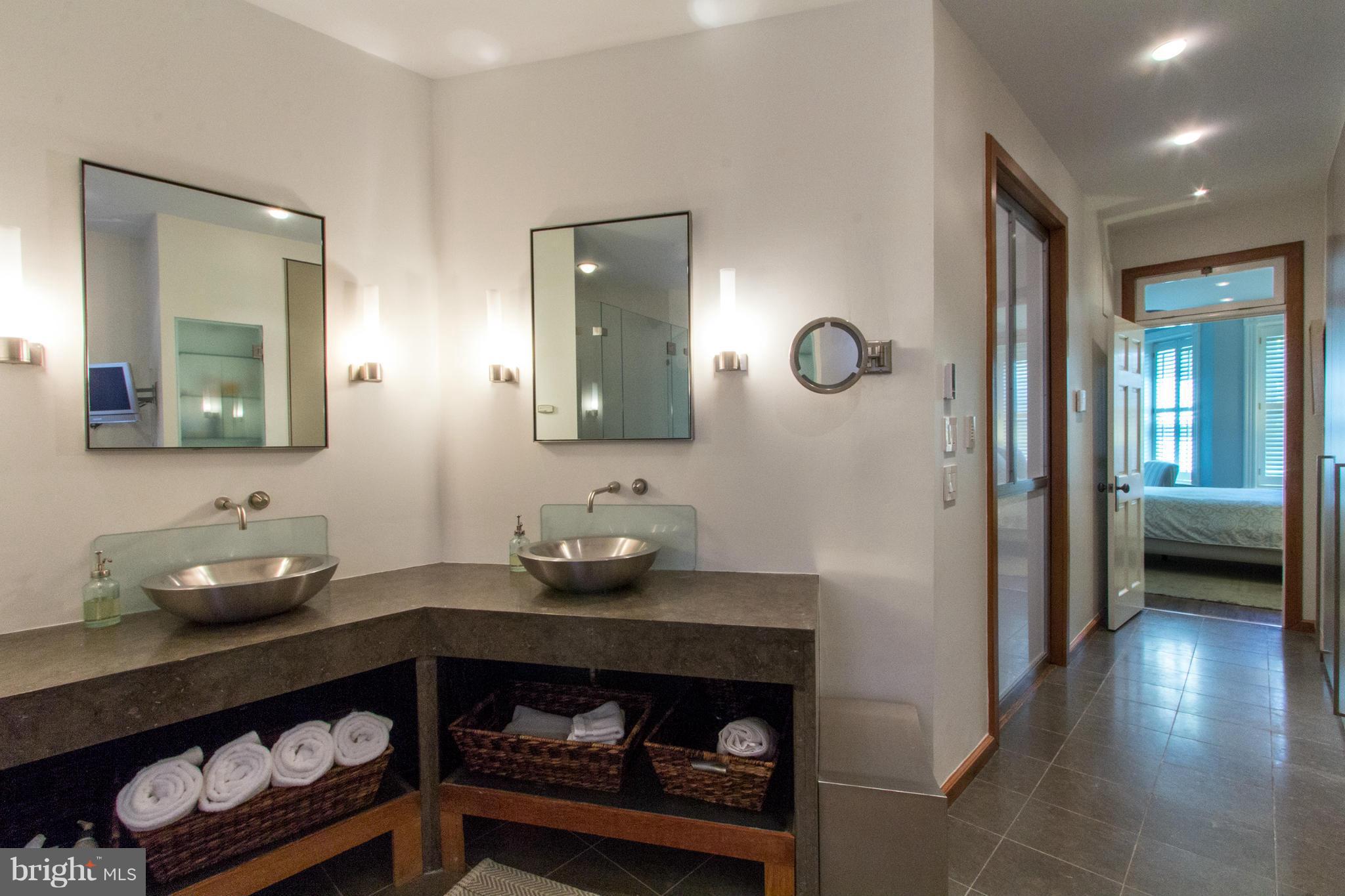 124 3rd Street Northeast Washington, DC 20002 - Photo 13 of 30 a bathroom with a sink and a mirror