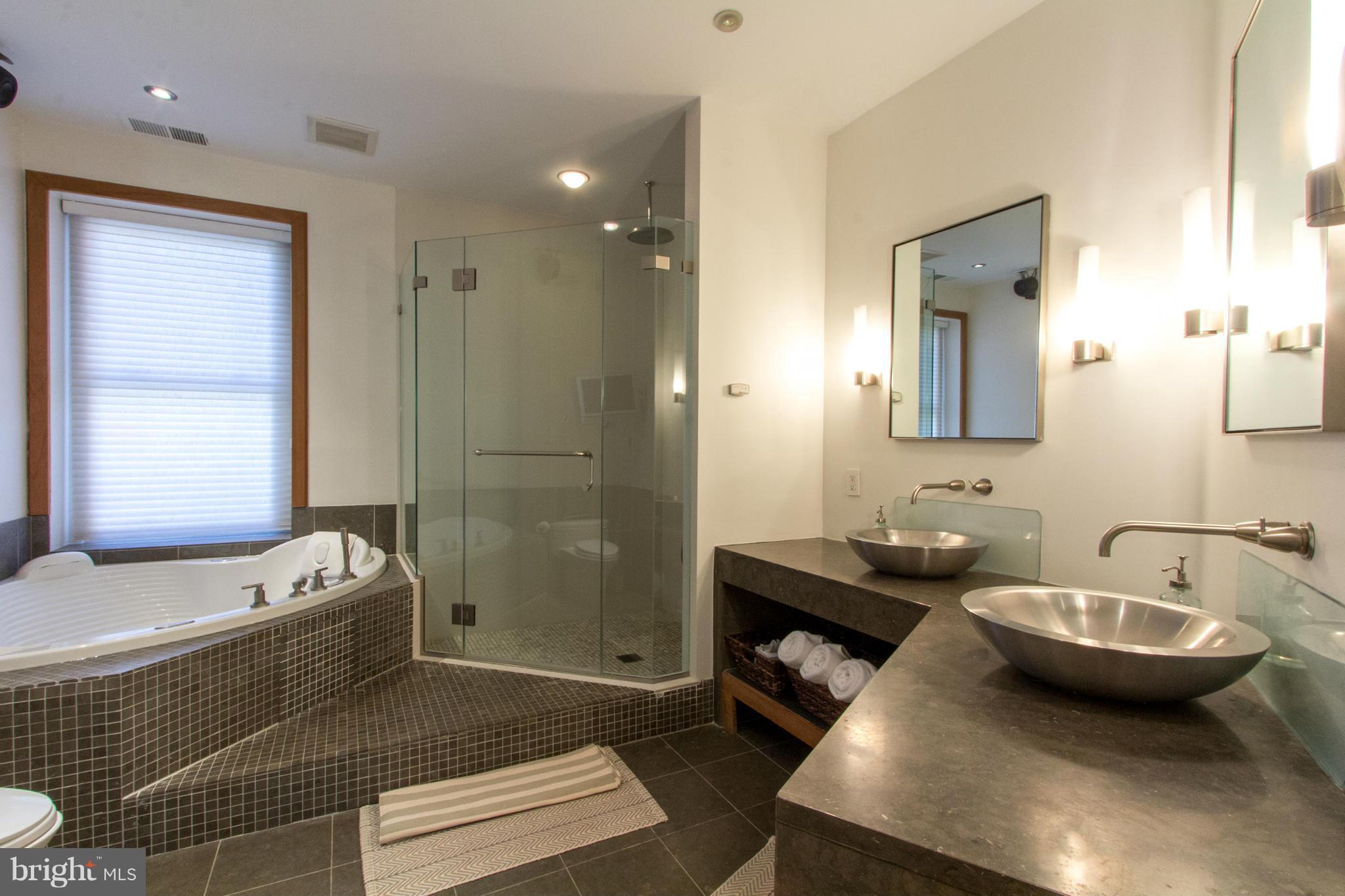 124 3rd Street Northeast Washington, DC 20002 - Photo 14 of 30 a bathroom with a sink and a mirror