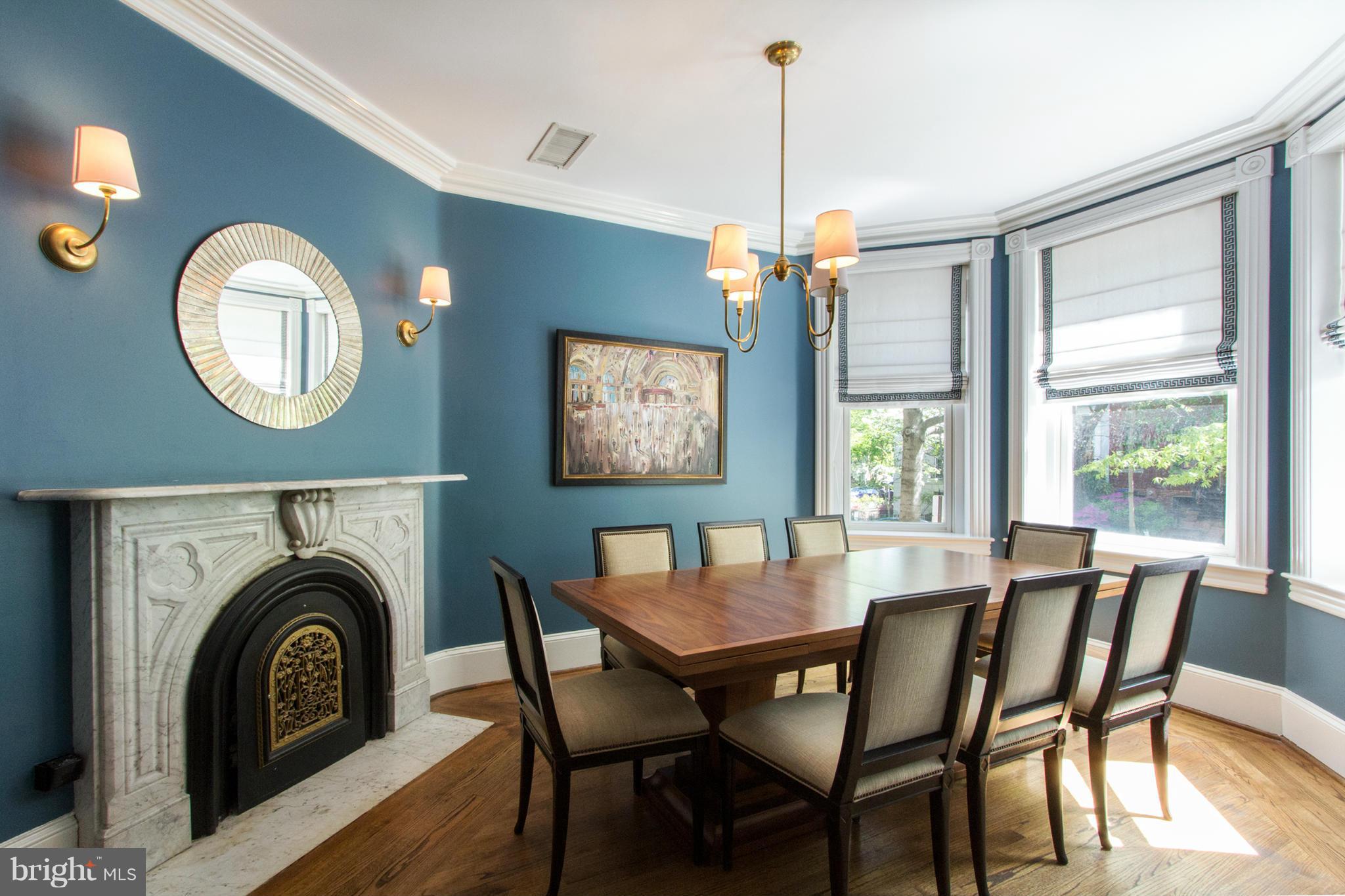 124 3rd Street Northeast Washington, DC 20002 - Photo 3 of 30 a view of a dining room with furniture window and wooden floor