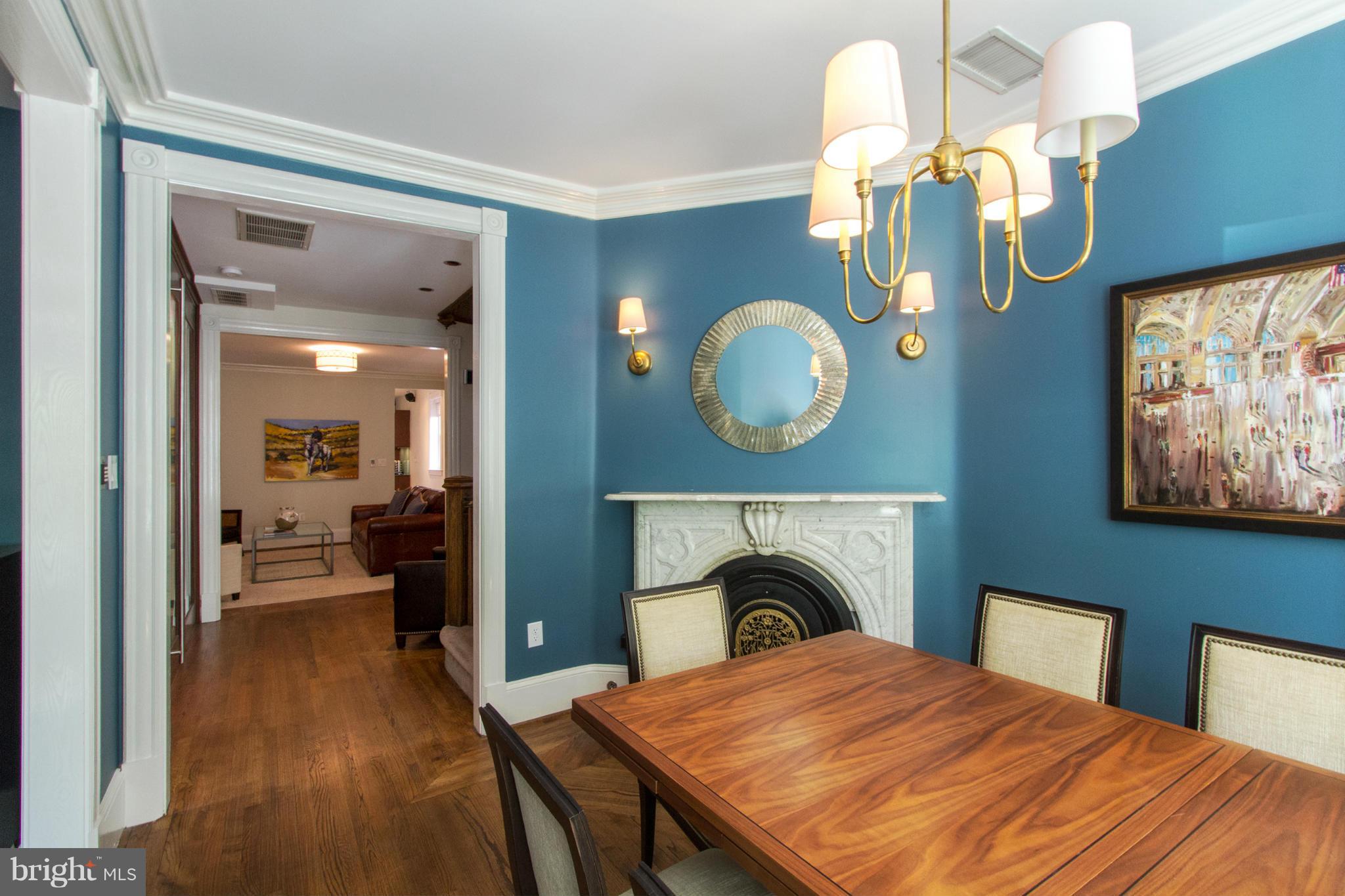 124 3rd Street Northeast Washington, DC 20002 - Photo 4 of 30 a bedroom with a bed and a mirror