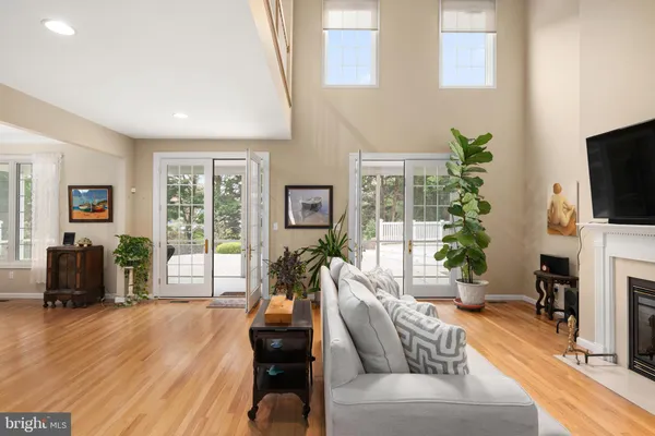 a kitchen with stainless steel appliances granite countertop a stove top oven a sink dishwasher and a microwave oven on the blue kitchen countertops