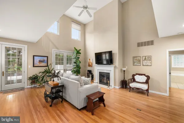 a kitchen with stainless steel appliances granite countertop wooden cabinets a stove top oven a sink and dishwasher