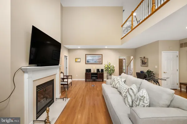 a kitchen with stainless steel appliances kitchen island granite countertop a sink and cabinets