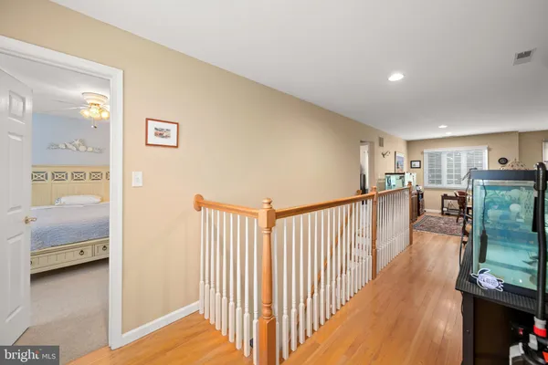 a bathroom with a double vanity sink toilet and shower
